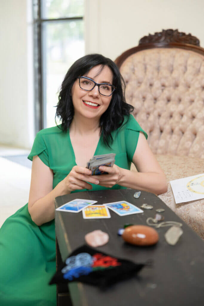 Tarot card reading with crystals and mystic items, exclusively at Embark on a captivating cosmic journey with Astrology Odyssey!